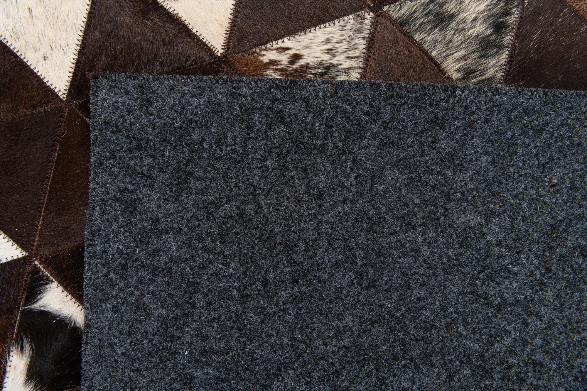 5' x 8' Cowhide Stocks Rug