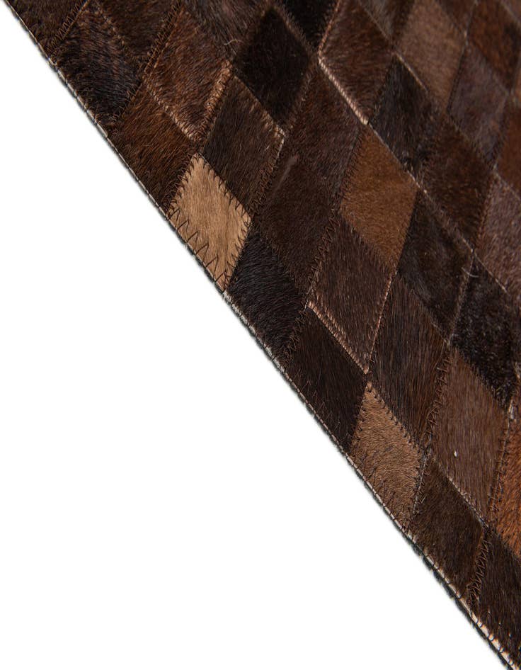 Detail image of 5' x 7' 11 Cowhide Stocks Rug