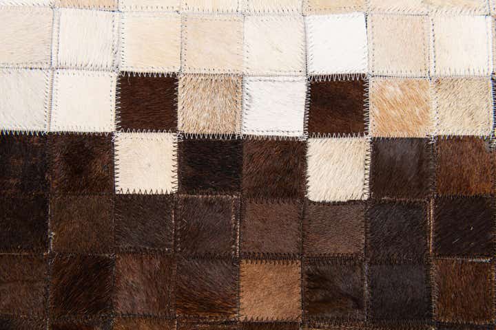 5' x 7' 11 Cowhide Stocks Rug