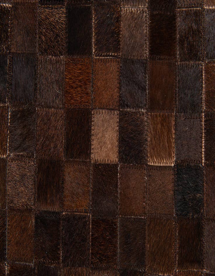Detail image of 5' x 7' 11 Cowhide Stocks Rug