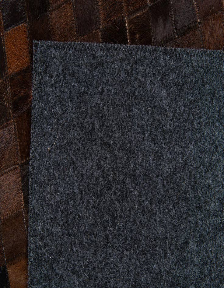 Detail image of 5' 1 x 7' 10 Cowhide Stocks Rug