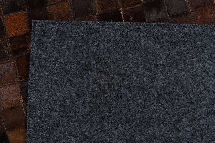 5' 1 x 7' 10 Cowhide Stocks Rug