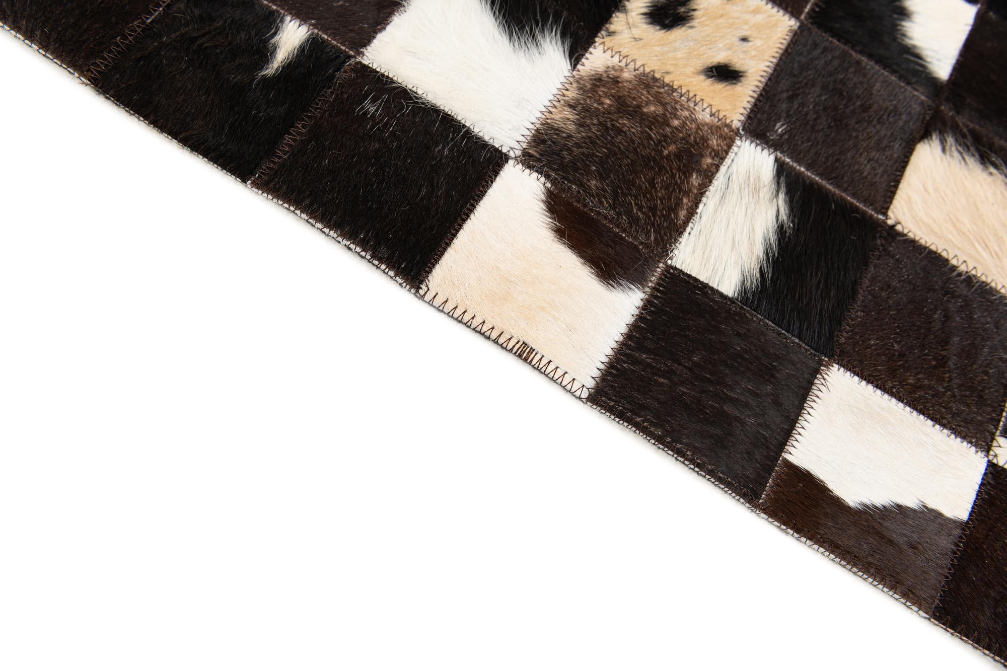 5' x 7' 11 Cowhide Stocks Rug