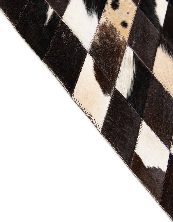 Detail image of 5' x 7' 11 Cowhide Stocks Rug