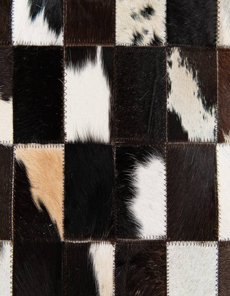 Detail image of 5' x 7' 11 Cowhide Stocks Rug