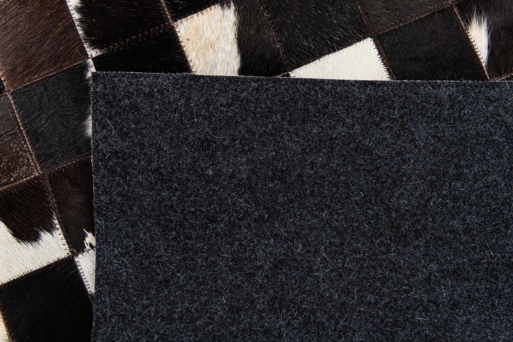 5' x 7' 11 Cowhide Stocks Rug