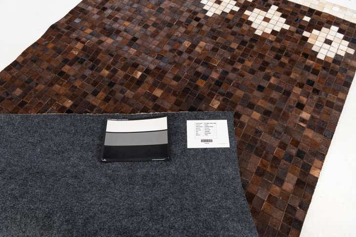 5' 1 x 8' 1 Cowhide Stocks Rug