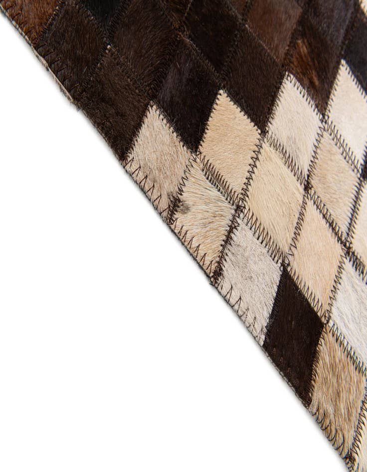 Detail image of 5' 1 x 8' Cowhide Stocks Rug