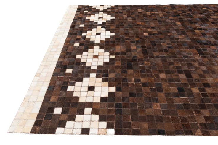 Detail image of 5' x 7' 11 Cowhide Stocks Rug