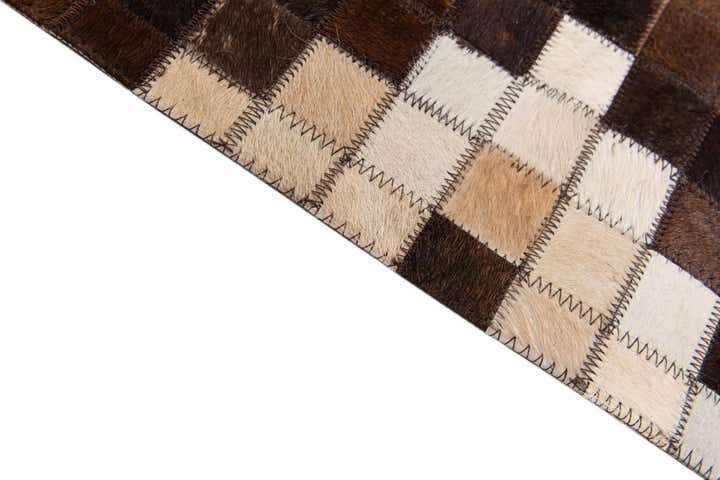 5' x 7' 11 Cowhide Stocks Rug