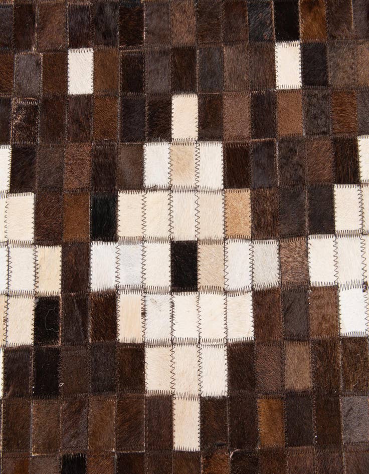 Detail image of 5' x 7' 11 Cowhide Stocks Rug
