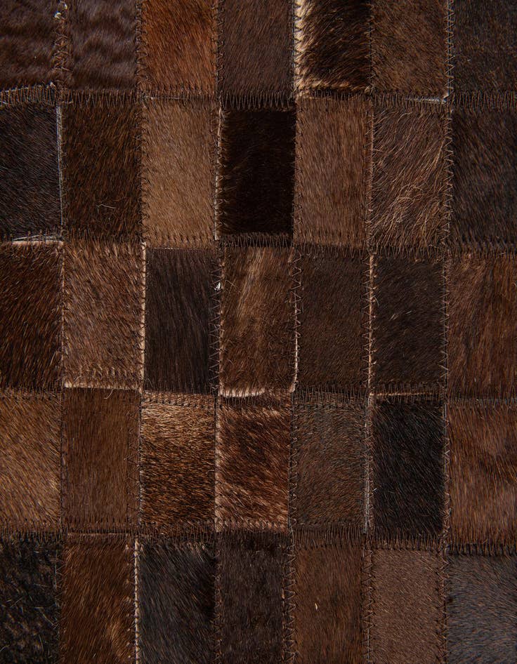 Detail image of 5' x 7' 11 Cowhide Stocks Rug