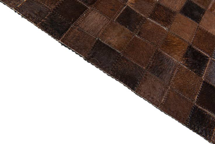 Detail image of 5' 1 x 8' 1 Cowhide Stocks Rug