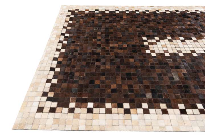 5' 2 x 8' 1 Cowhide Stocks Rug