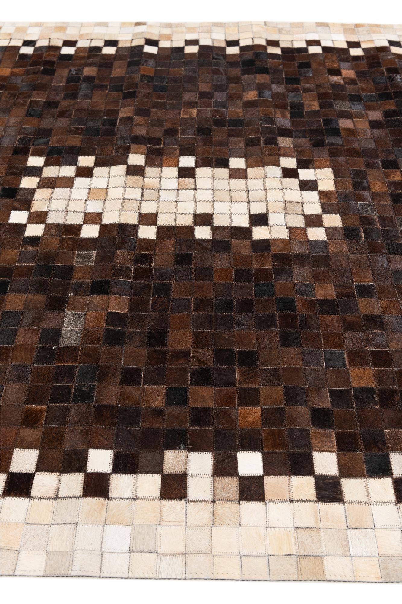 5' 2 x 8' 1 Cowhide Stocks Rug