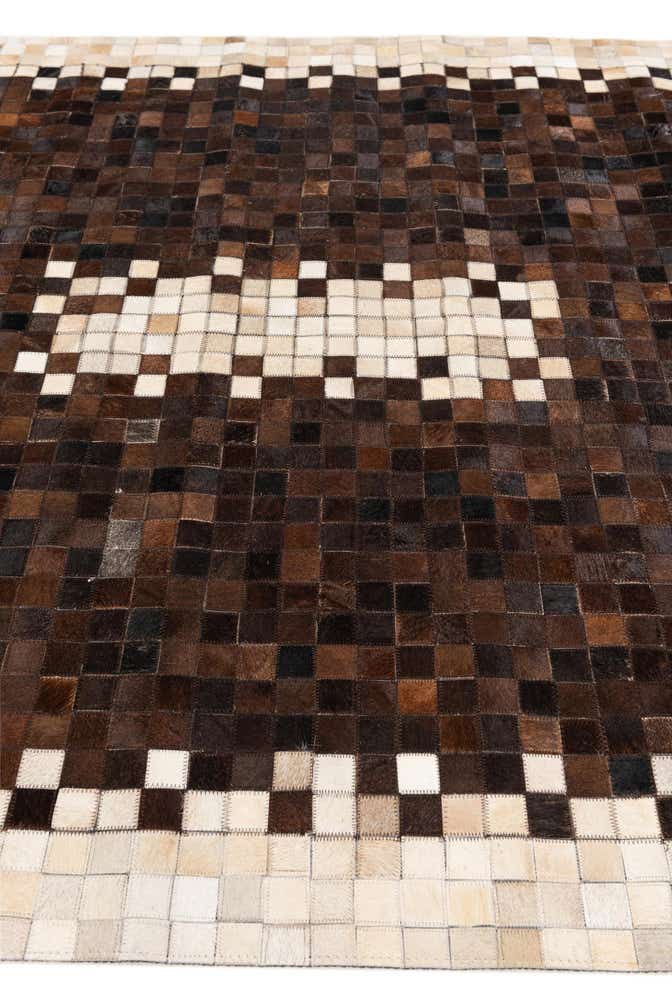 5' 2 x 8' 1 Cowhide Stocks Rug