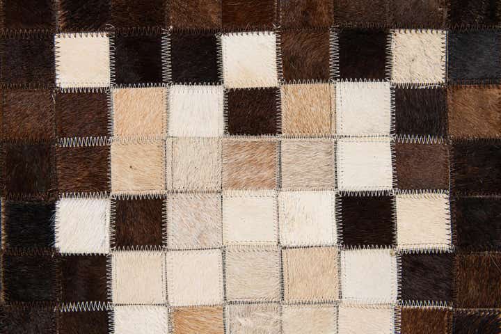 5' 2 x 7' 11 Cowhide Stocks Rug