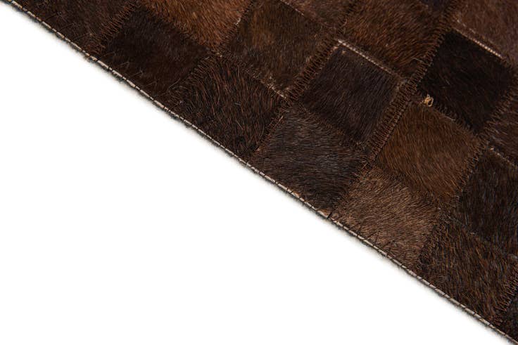 Detail image of 5' 2 x 8' Cowhide Stocks Rug