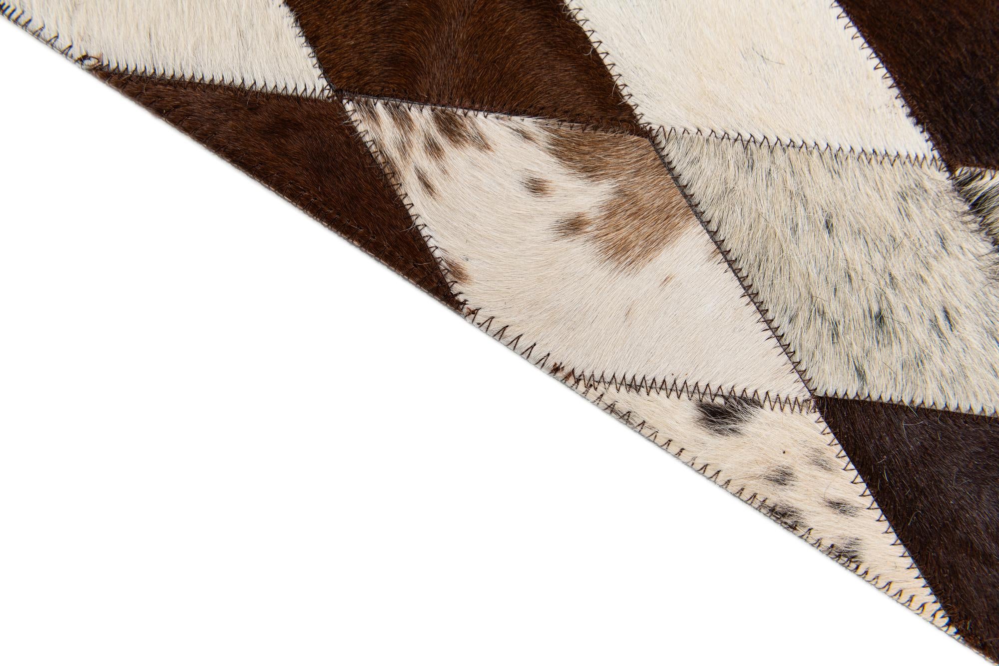 5' 8 x 7' 1 Cowhide Stocks Rug