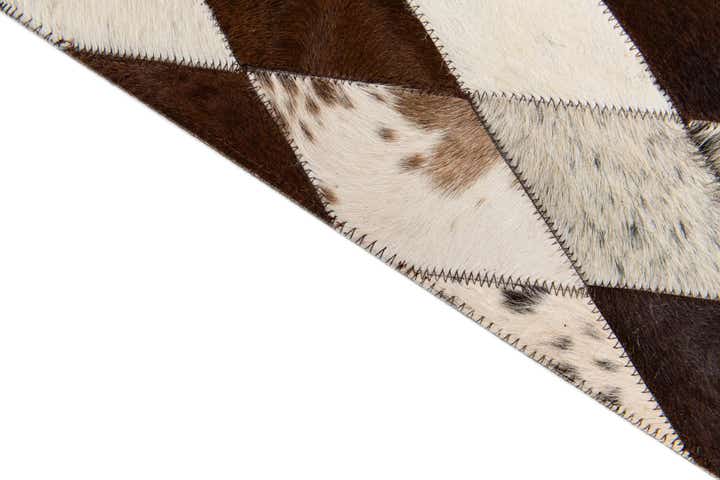 5' 8 x 7' 1 Cowhide Stocks Rug