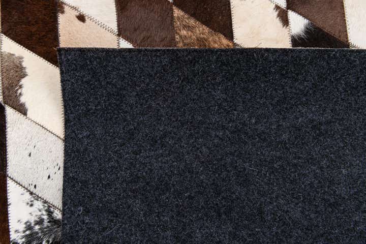 5' 8 x 7' 1 Cowhide Stocks Rug
