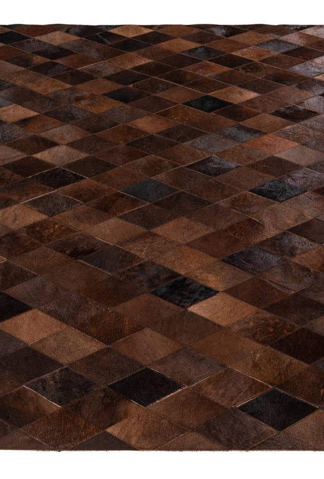 Detail image of 5' 1 x 8' Cowhide Stocks Rug