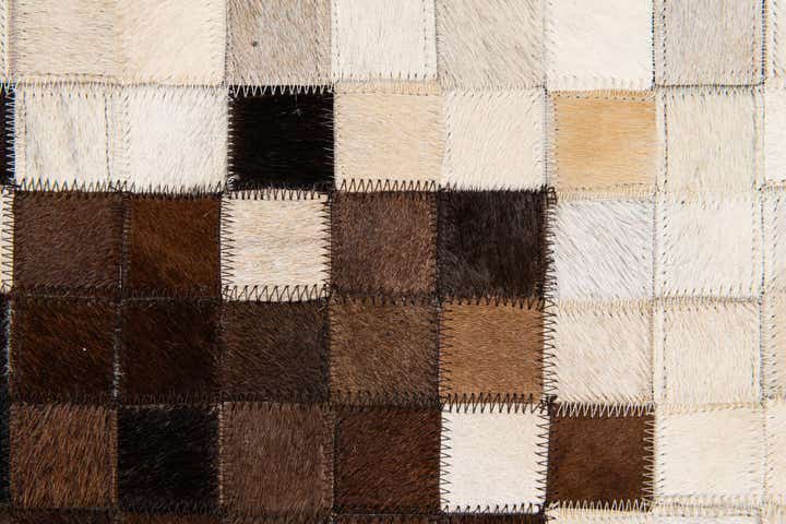 5' 2 x 8' 2 Cowhide Stocks Rug