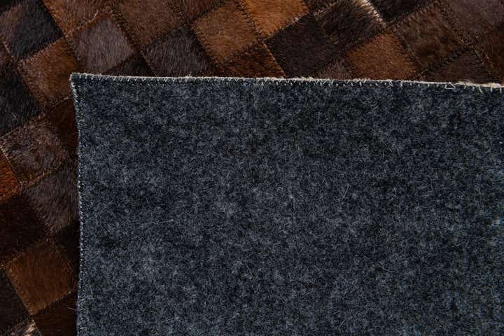 5' 2 x 8' 2 Cowhide Stocks Rug