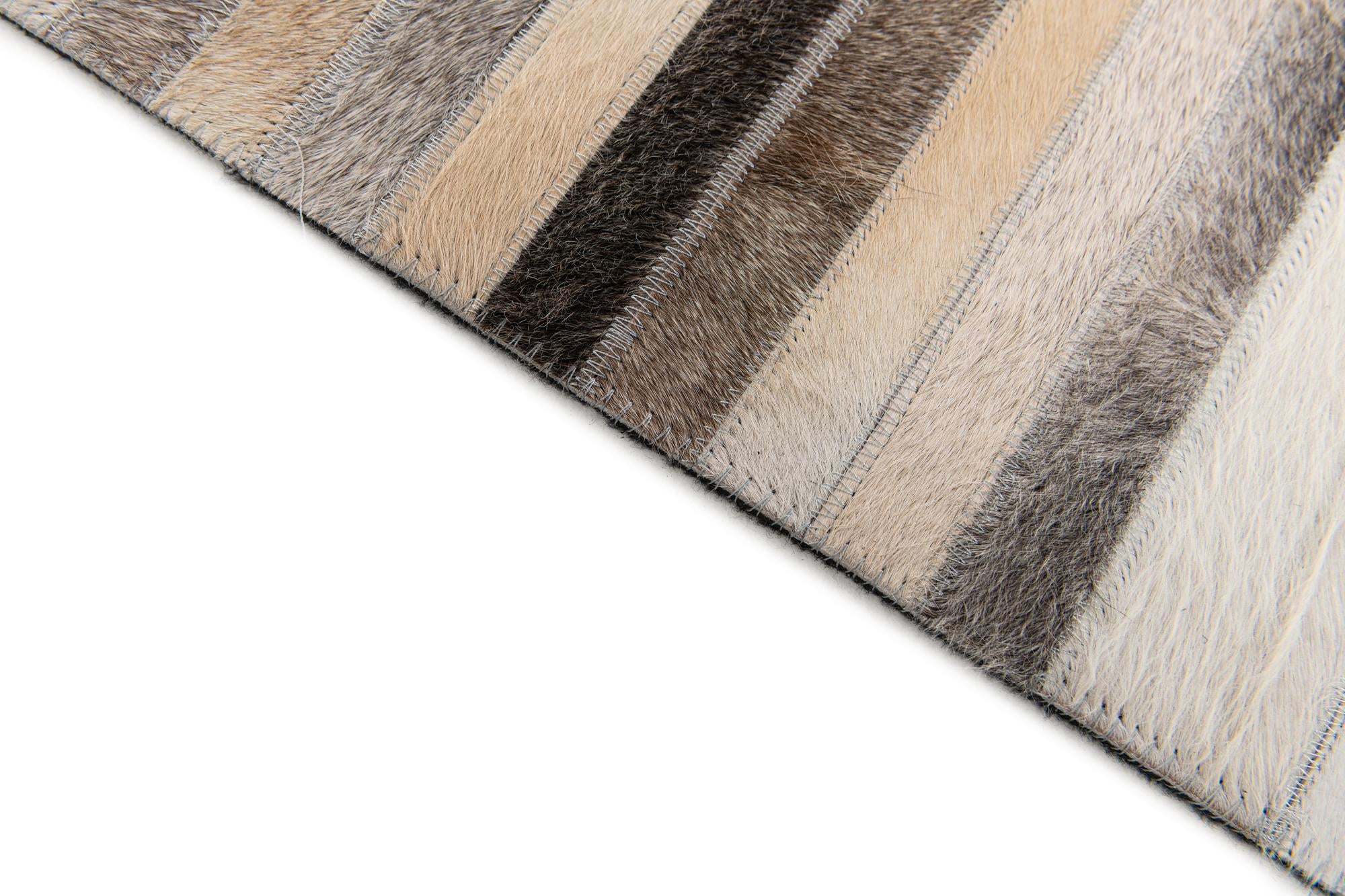 5' 1 x 8' Cowhide Stocks Rug