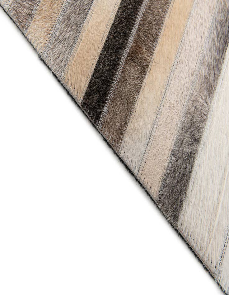 Detail image of 5' 1 x 8' Cowhide Stocks Rug