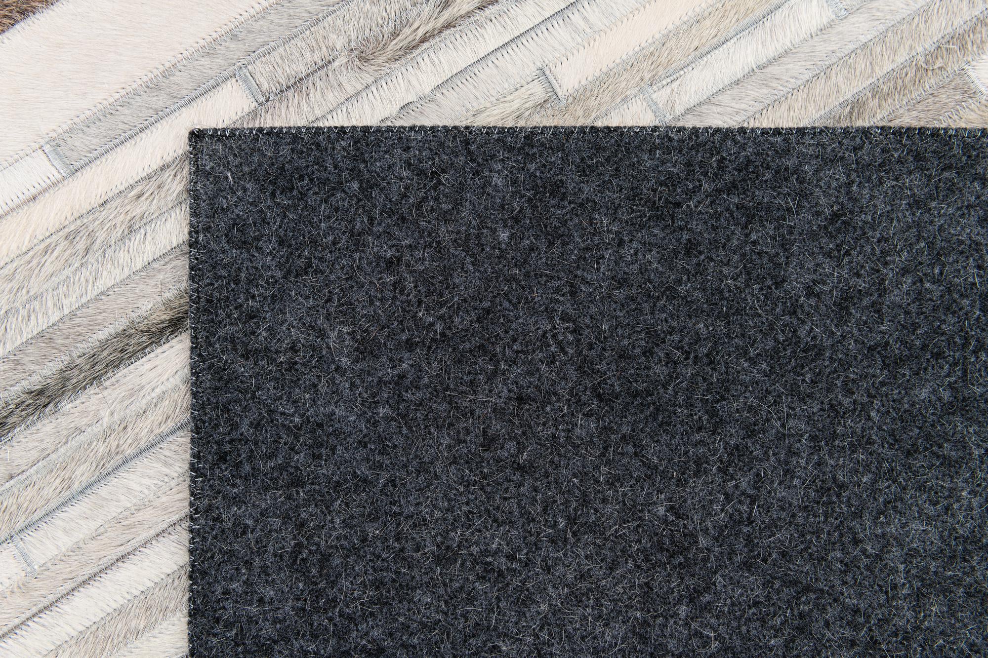 5' 1 x 8' Cowhide Stocks Rug