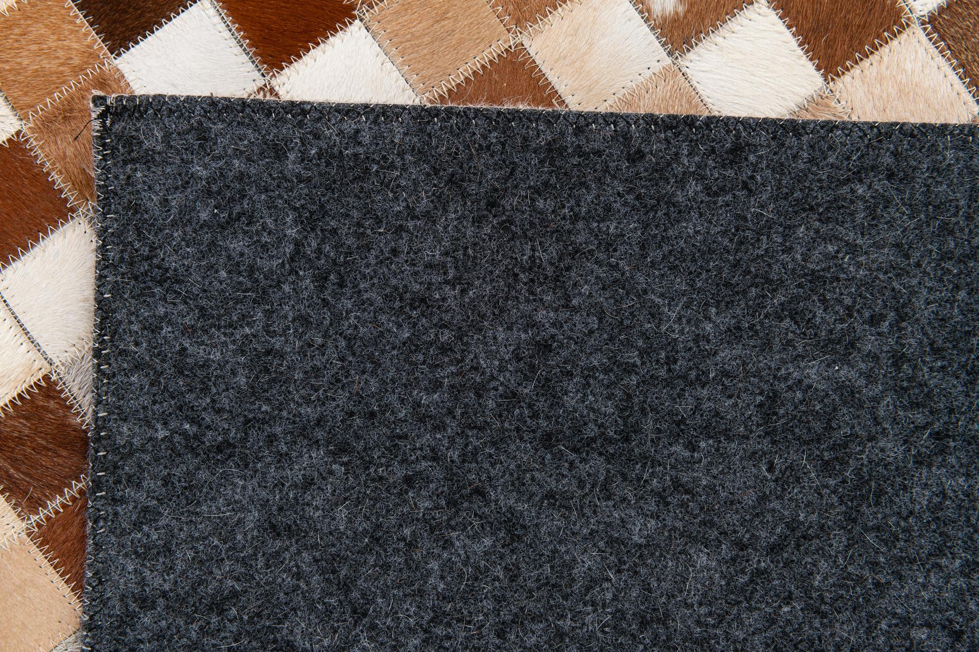 5' 1 x 7' 10 Cowhide Stocks Rug