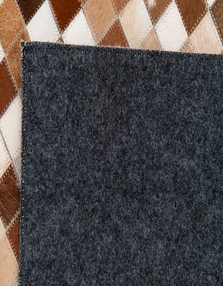 Detail image of 5' 1 x 7' 10 Cowhide Stocks Rug