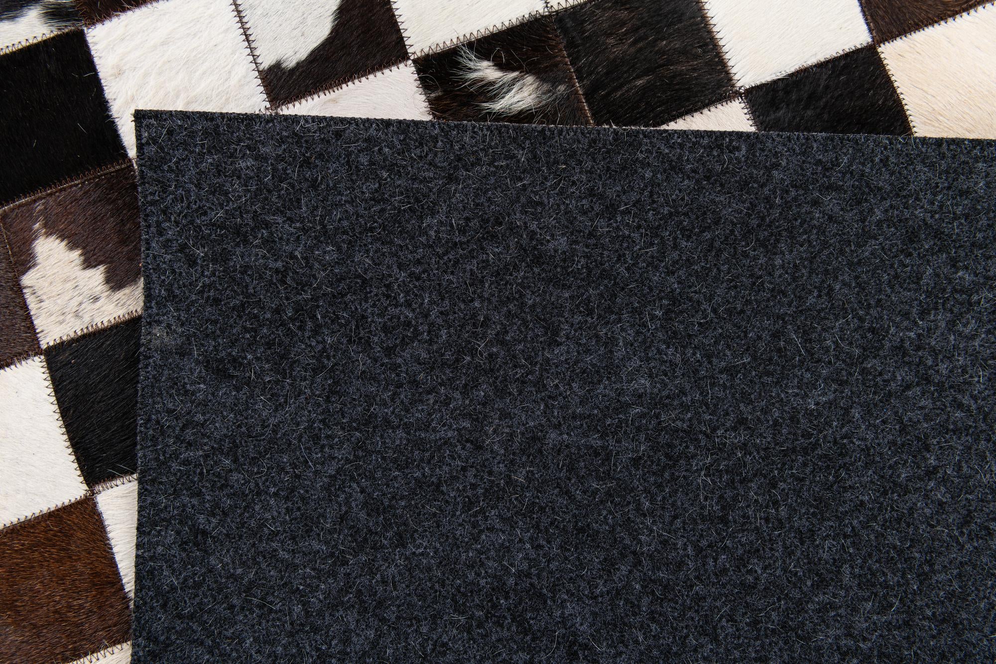 5' x 8' Cowhide Stocks Rug