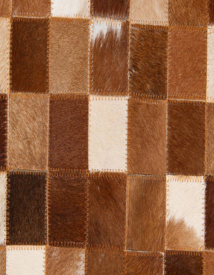 Detail image of 5' x 7' 11 Cowhide Stocks Rug