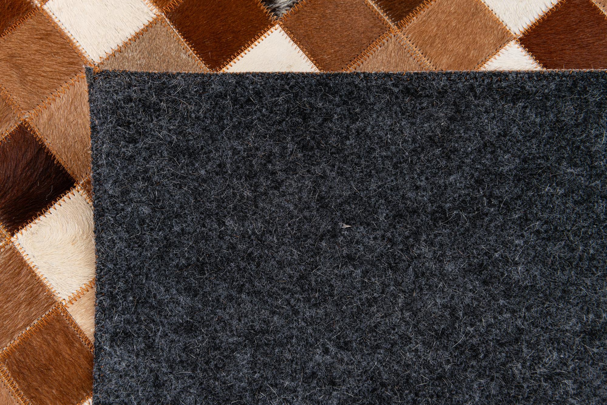 5' 1 x 7' 11 Cowhide Stocks Rug