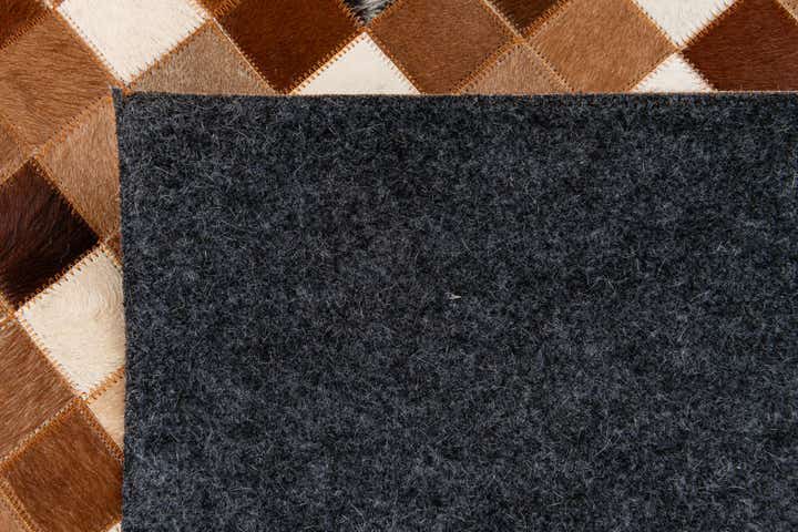 5' 1 x 7' 11 Cowhide Stocks Rug