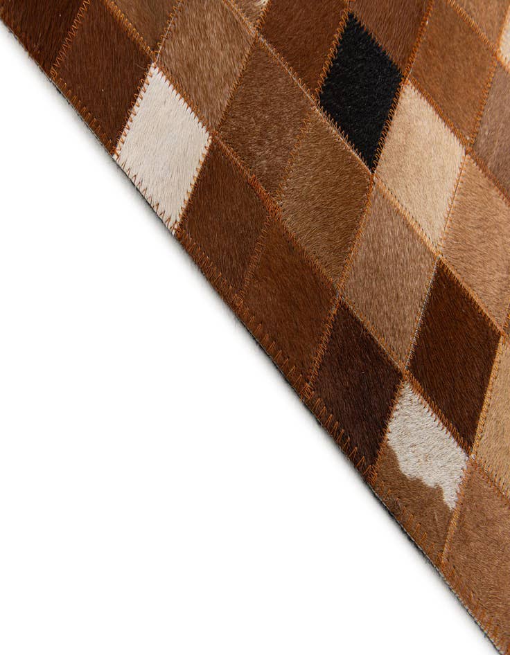 Detail image of 5' 1 x 8' 2 Cowhide Stocks Rug