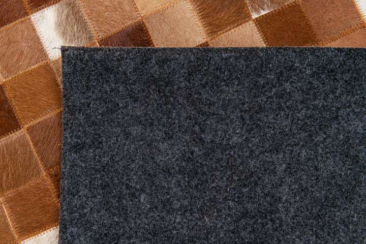 5' 1 x 7' 11 Cowhide Stocks Rug