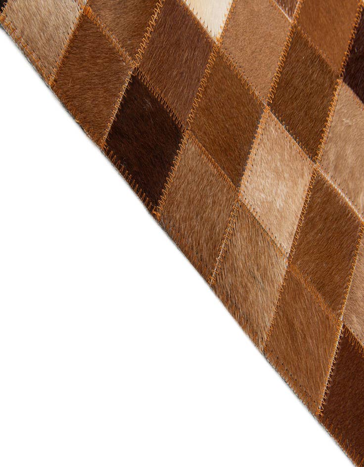 Detail image of 5' 1 x 8' 1 Cowhide Stocks Rug