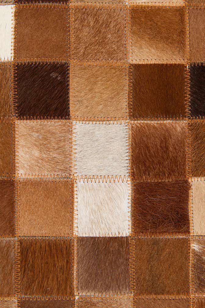 5' 1 x 8' 1 Cowhide Stocks Rug