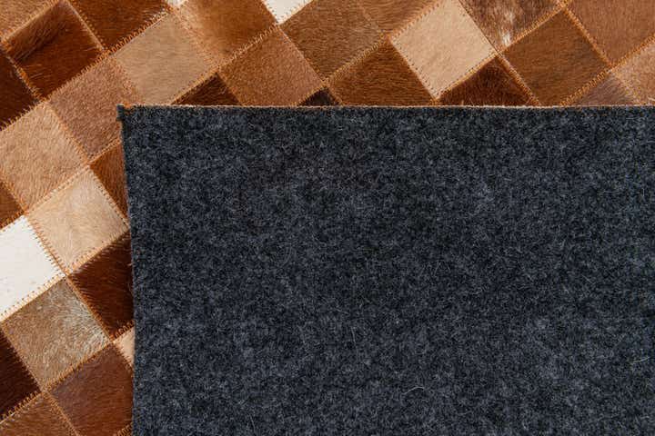 5' 1 x 8' 1 Cowhide Stocks Rug
