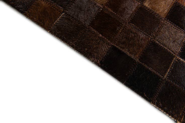 Detail image of 5' x 7' 11 Cowhide Stocks Rug