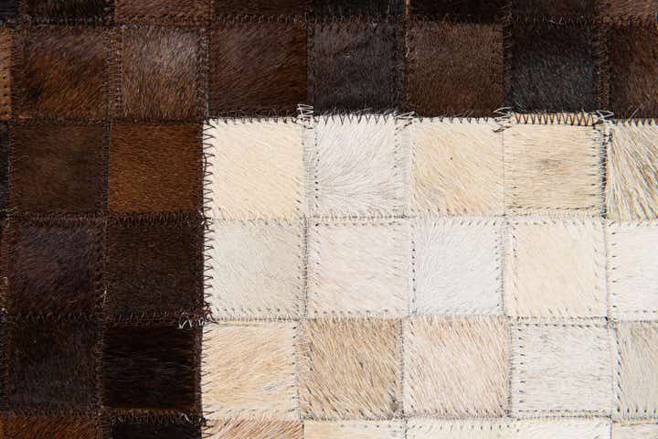 5' x 7' 11 Cowhide Stocks Rug