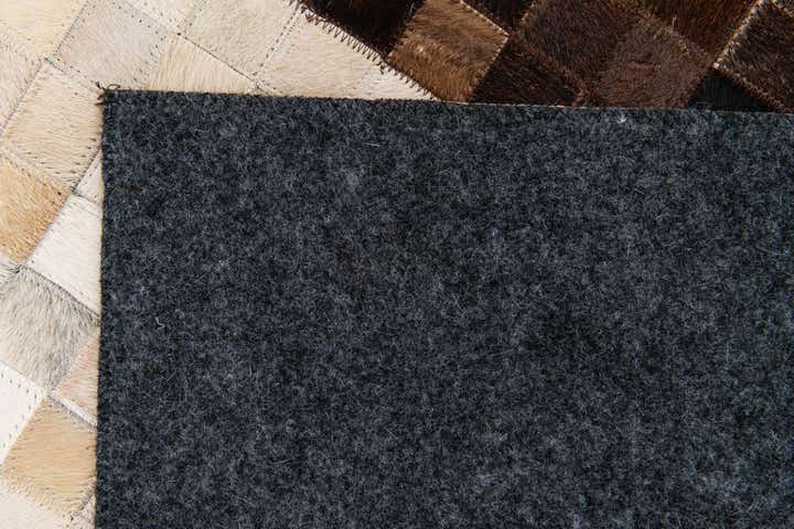 5' x 7' 11 Cowhide Stocks Rug