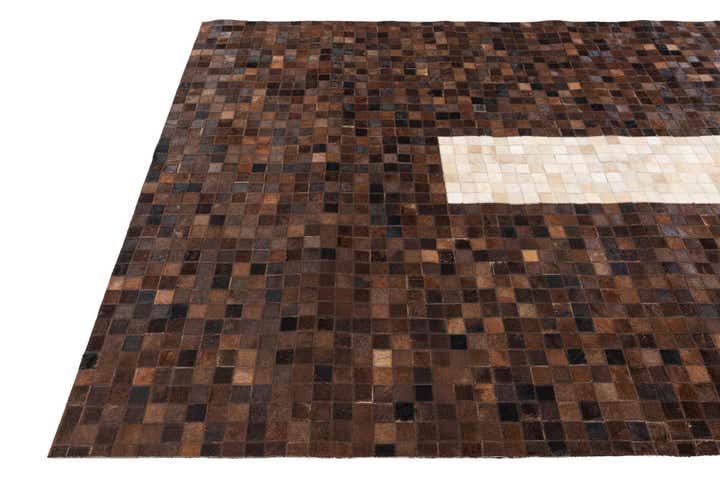 5' 2 x 8' 1 Cowhide Stocks Rug