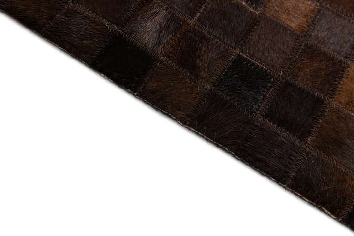 5' 2 x 8' 1 Cowhide Stocks Rug