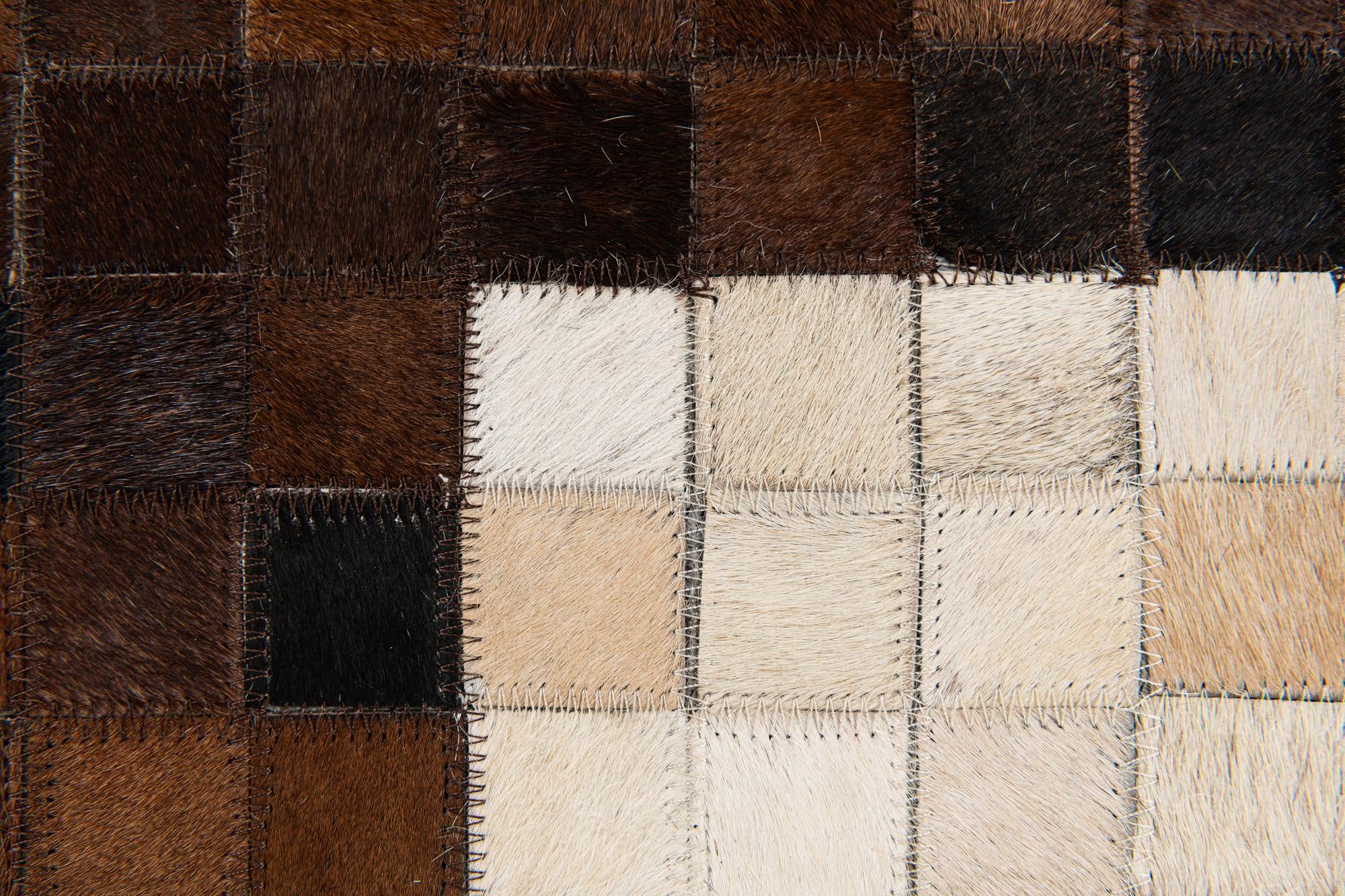 5' 2 x 8' 1 Cowhide Stocks Rug