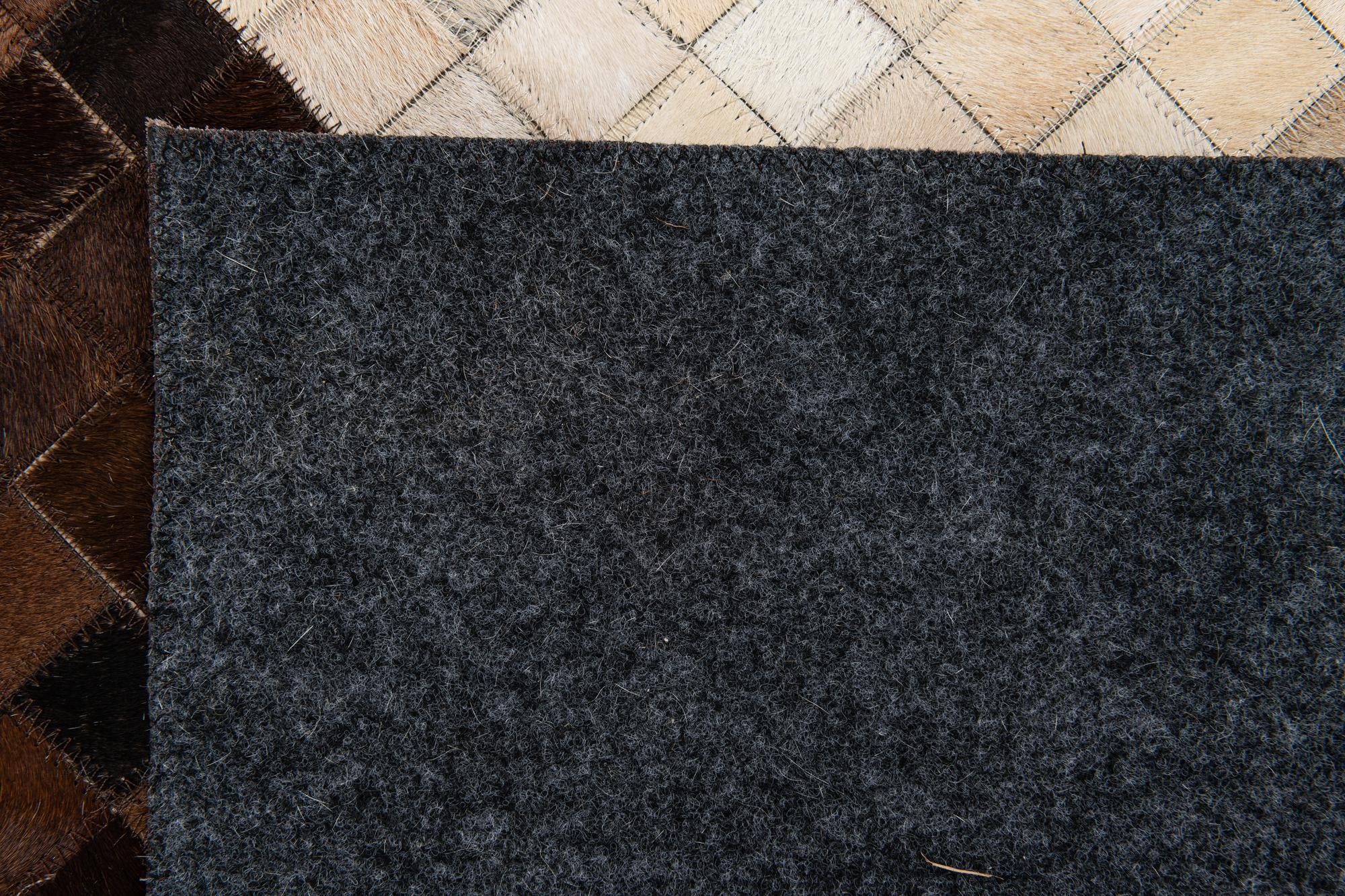 5' 2 x 8' 1 Cowhide Stocks Rug