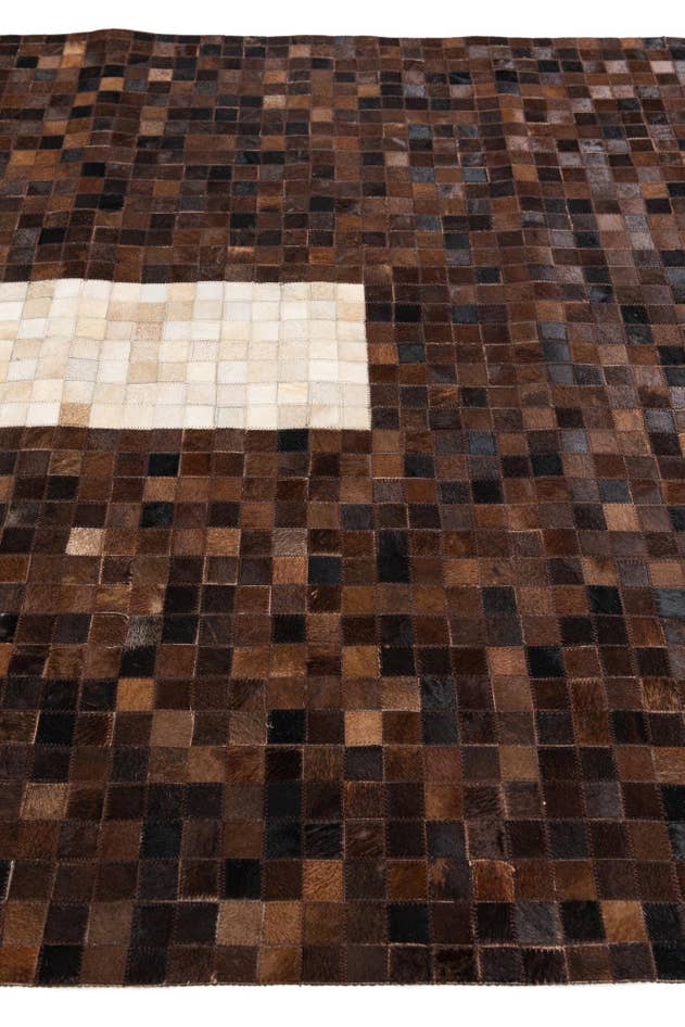 Detail image of 5' x 7' 11 Cowhide Stocks Rug